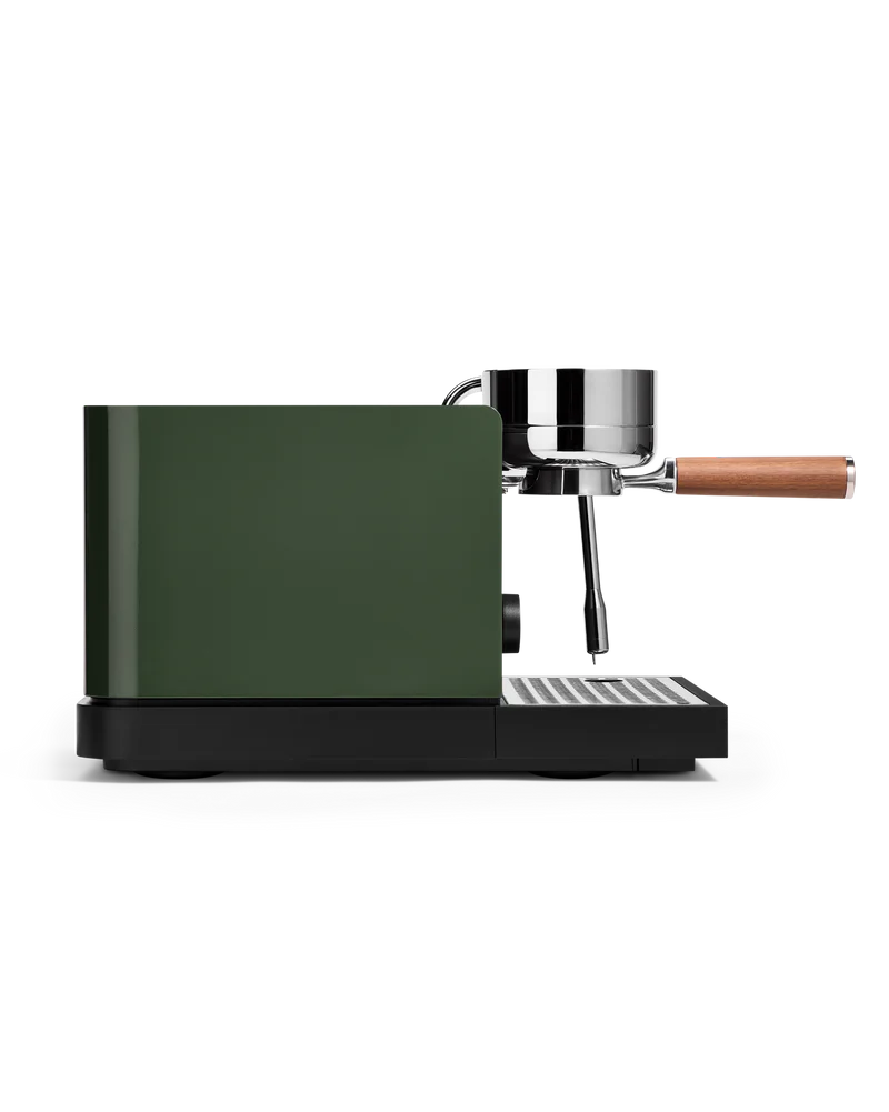 Black Fellow Espresso Series 1 Espresso Machine side view with portafilter attached, showcasing sleek design and precision.