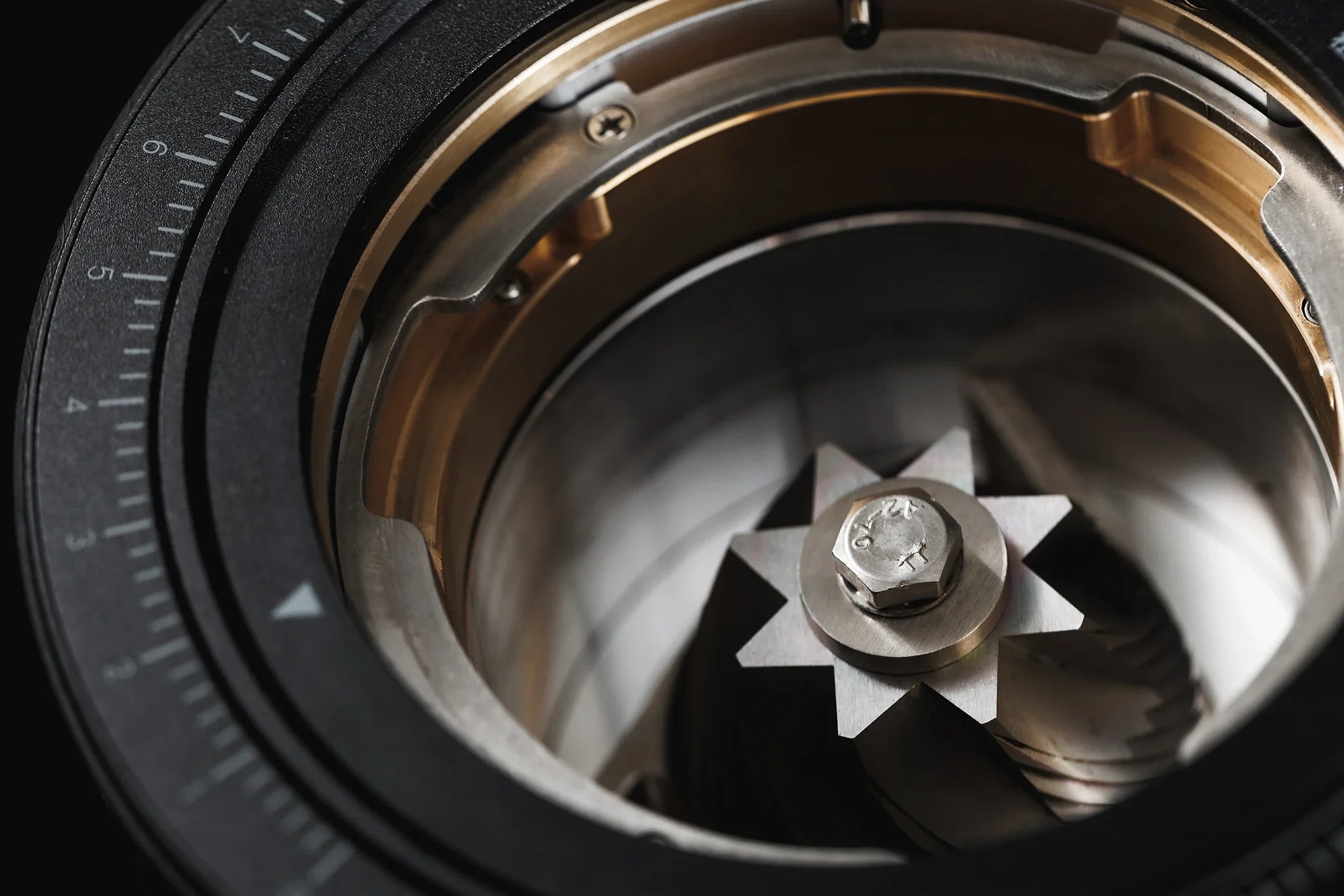Close-up of a WPM KONOS offee grinder 71mm burrs
