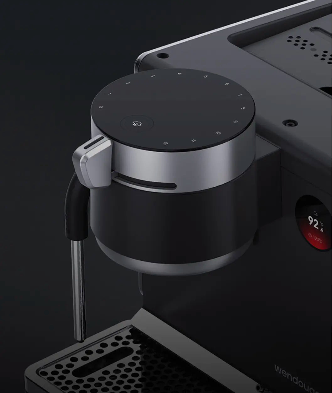Close-up of a Wendougee LITA Sigma coffee machine with a dark background showing the paddle to control the pressure and the flow 